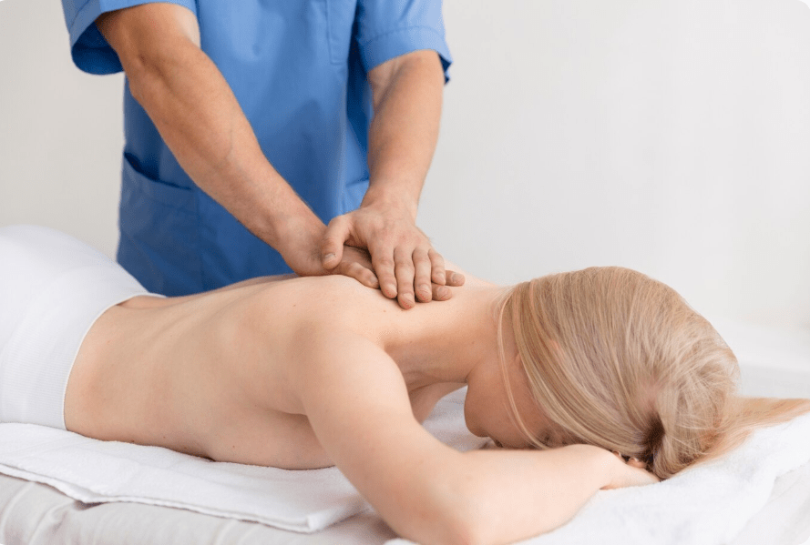 Myoskeletal Therapist working with client in myofascial session 4